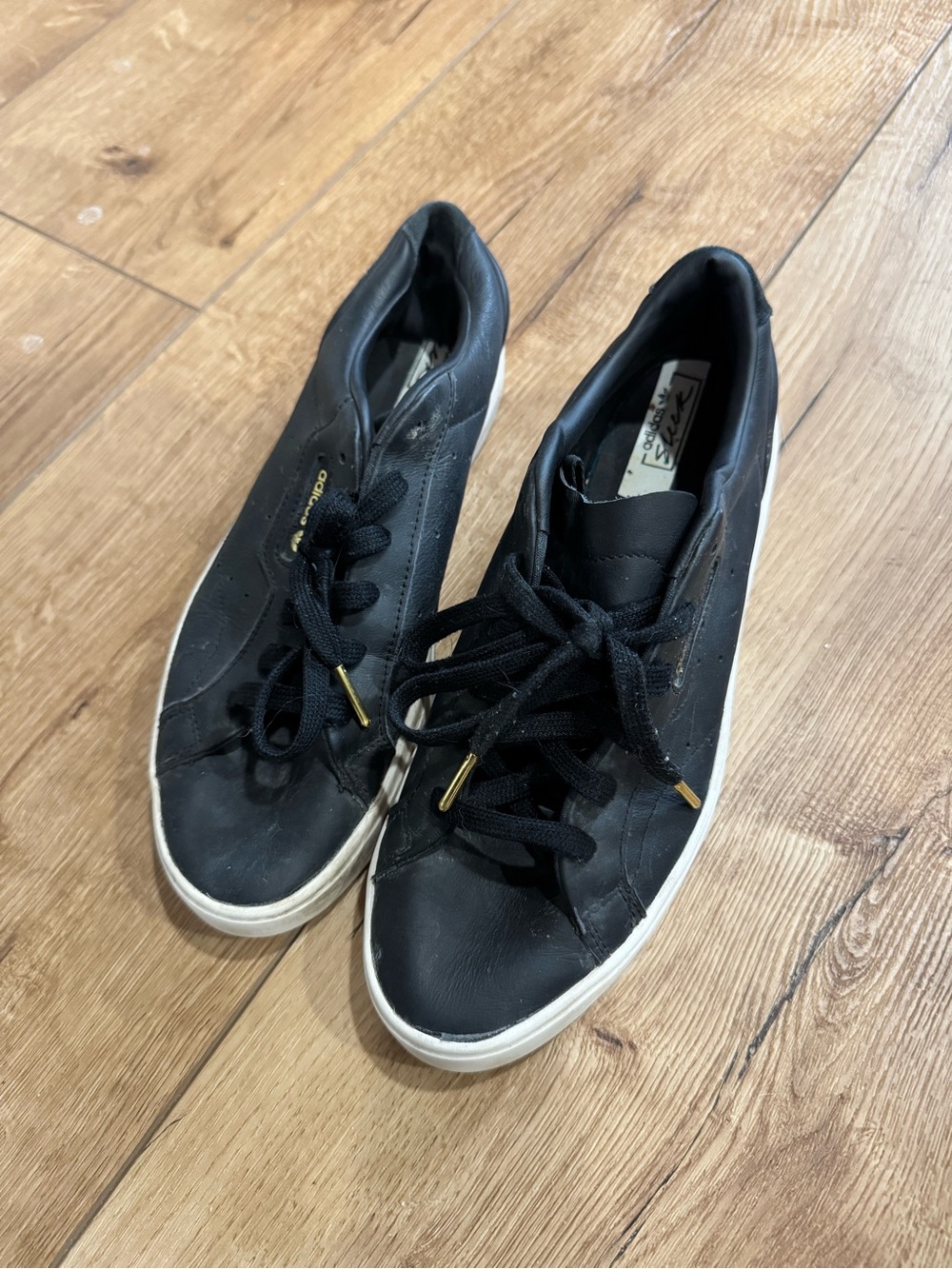 black and gold adidas sneakers